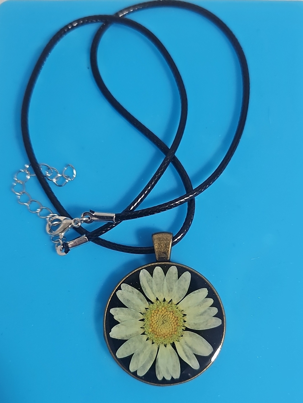 Daisy Pendant Necklace In Resin on Black Cord